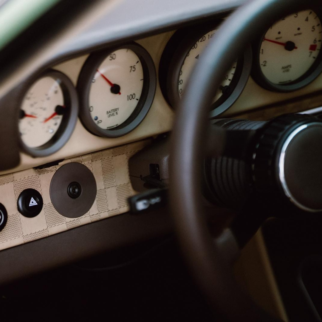 Dashboard instruments and steering wheel inside the Revolt Electric
